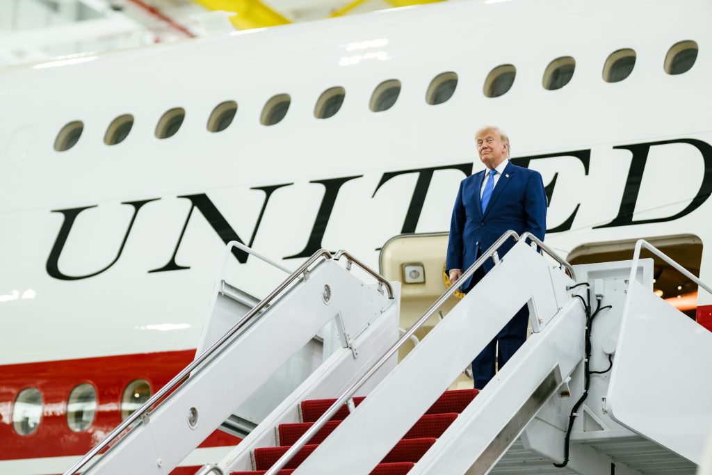 President Donald Trump on the stairs of the Qatar-provided Boeing 747 at Joint Base Andrews on June 19, 2026.